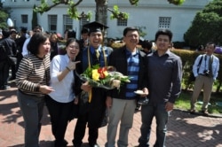 Jirayuth Latthivongskorn, a DACA recipient, celebrated with family after graduating from UCBerkeley