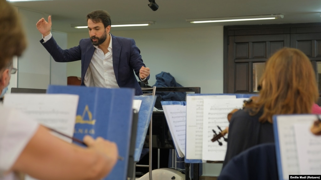 Lebanon's national orchestra conductor Lubnan Baalbaki during a practice in Beirut, Lebanon November 2, 2021. (REUTERS/Emilie Madi)