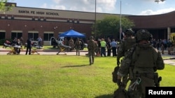 Des membres des forces spéciales américaines au lycée de Santa Fe, Texas, le 18 mai 2018.