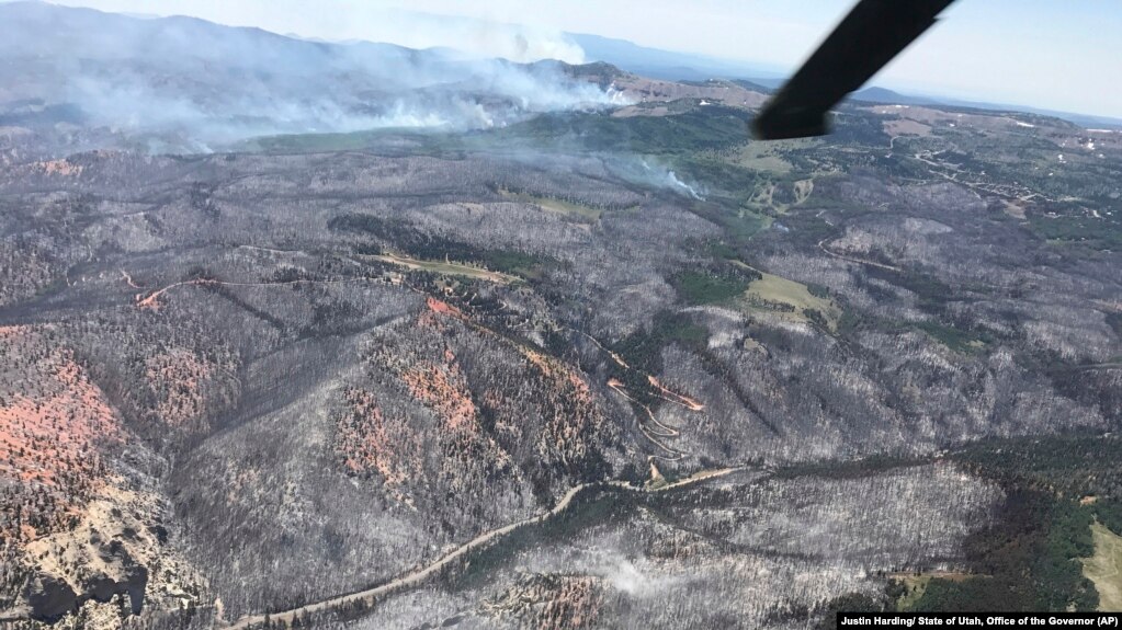 A burnout area between Parowan and Brian Head, seen during a wildfire tour by Utah Lt. Gov. Spencer Cox, in southern Utah, June 26, 2017. The nation's largest wildfire has forced more than 1,500 people from their homes and cabins in a southern Utah mountain area home to a ski town and popular fishing lake.