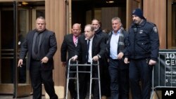 Former American film producer Harvey Weinstein leaves court following a hearing in New York.