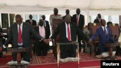 South Sudan's President Salva Kiir takes part in a national day of prayers for peace at the state house in Juba, South Sudan, Sept. 19, 2019. 