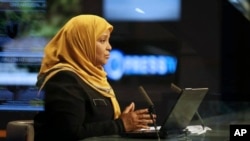 Undated photo provided by Iranian state television's English-language service, Press TV, shows its American-born news anchor Marzieh Hashemi.