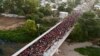 Central American migrants - mostly Hondurans, travelling on caravan to the U.S - remain at the international bridge that connects Tecum Uman, Guatemala, with Ciudad Hidalgo, Mexico.