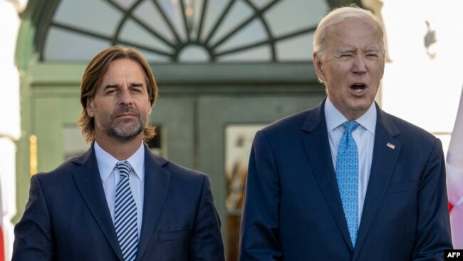 U.S. President Joe Biden and Uruguayan President Luis Lacalle Pou pose for a photo at the White House in Washington on Nov. 3, 2023, during the inaugural Americas Partnership for Economic Prosperity Leaders’ Summit.
