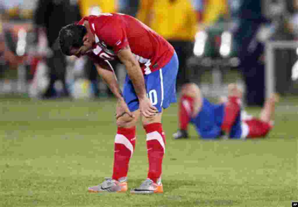 Serbia's Dejan Stankovic reacts at the end of the World Cup group D soccer match between Serbia and Ghana at the Loftus Versfeld Stadium in Pretoria, South Africa, Sunday, June 13, 2010. Ghana won 1-0. (AP Photo/Darko Vojinovic)