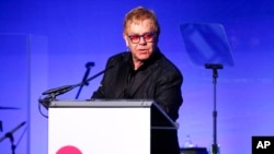 Elton John speaks at the Elton John AIDS Foundation’s 14th Annual "An Enduring Vision" Benefit at Cipriani Wall Street on Nov. 2, 2015, in New York.