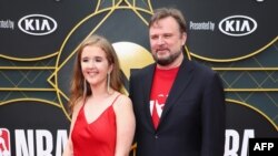 FILE - General Manager of the Houston Rockets Daryl Morey (R) and Ellen Morey attend the 2019 NBA Awards presented by Kia on TNT at Barker Hangar, in Santa Monica, California, June 24, 2019.