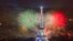 The Eiffel Tower is illuminated during the traditional Bastille Day fireworks display in Paris, July 14, 2013. 