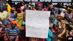 FILE - Victims of a gunmen attack protest at the internal displaced camp in Bokkos, north central Nigeria, Wednesday, Dec. 27, 2023.