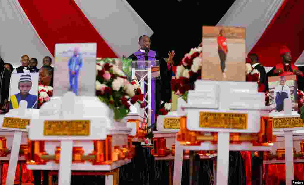 Coffins are arranged before a memorial service for the pupils who died after a fatal fire at the Hillside Endarasha Academy within Kieni in Nyeri County, Kenya.