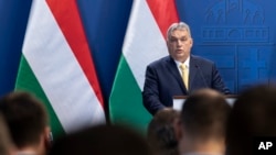 FILE - Hungarian Prime Minister Viktor Orban adresses the media during a press conference in Budapest, Hungary, Jan. 9, 2020.