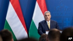 FILE - Hungarian Prime Minister Viktor Orban adresses the media during a press conference in Budapest, Hungary, Jan. 9, 2020.