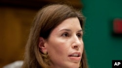 FILE - Dr. Luciana Borio, assistant commissioner for counterterrorism policy at the U.S. Food and Drug Administration (FDA) testifies on Capitol Hill , Oct. 16, 2014.