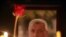 FILE - A portrait of Oliver Ivanovic is seen during a memorial service for the Kosovo Serb leader in Mitrovica, Kosovo, Jan. 16, 2018.