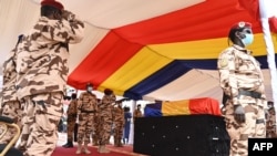 Chad army officers pay tribute to late Chadian President Idriss Deby Itno during the state funeral in N'Djamena, April 23, 2021.