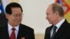 FILE - North Korea's ambassador to Russia, Kim Hyun Joon, pictured with Russian President Vladimir Putin in November 2014, says "it is well-known that the DPRK is already a nuclear state in both content and form."