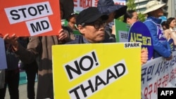 Xwepêşanderên Koreya Başûrî ku li dijî THAAD in