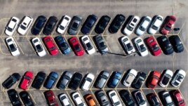 Cars are parked in an auto dealer lot Wednesday, April 15, 2020, in Green Park, Mo. U.S. retail sales recorded a record drop in March, with auto sales down 25.6%, as the coronavirus outbreak closed thousands of stores and shoppers stayed home.