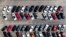 Cars are parked in an auto dealer in Green Park, Mo. U.S. retail sales recorded a record drop in auto sales as the coronavirus outbreak closed down thousands of stores and shoppers stayed home.