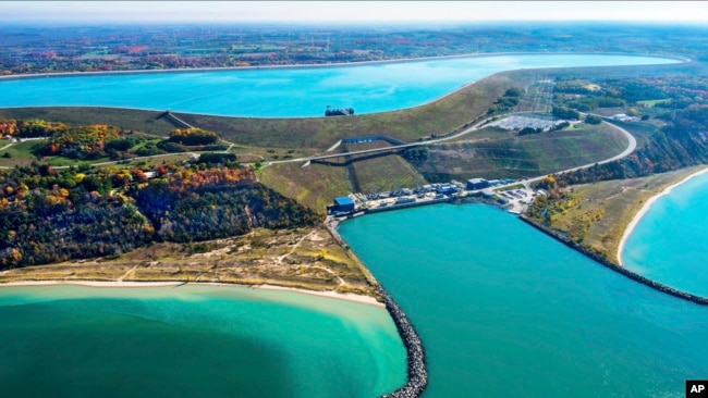 This undated photo provided by Consumers Energy shows an aerial view of the Ludington Pumped Storage Plant near Ludington, Mich. Advocates of pumped storage call such facilities the "world's largest batteries." (AP Photo/Consumers Energy)