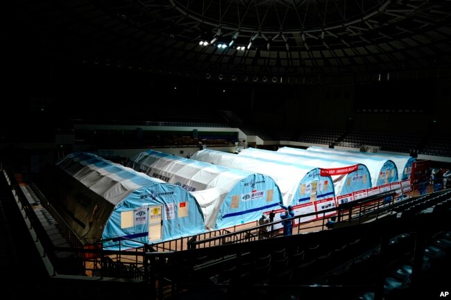 A temporary COVID-19 testing lab is seen in an arena in Shanghai, China, Friday, April 15, 2022. (Zhang Jiansong/Xinhua via AP)