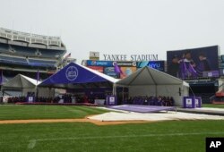 An image of the NYU graduation at Yankee Stadium in New York in 2014. (AP Photo/Frank Franklin II)