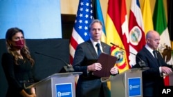 U.S. Secretary of State Antony Blinken, center, gives a press conference at a ministerial conference on migration and protection in Panama City, April 20, 2022. With him are U.S. Secretary of Homeland Security Alejandro Mayorkas and Panamanian Foreign Minister Erika Mouynes.