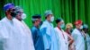 Shugaba Muhammadu Buhari (tsakiya) a wajen taron majalisar zartarwar jam'iyyar APC A Abuja