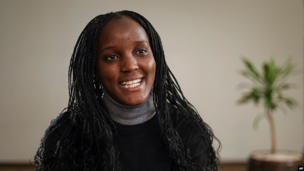 In this file photo, Ugandan climate activist Vanessa Nakate is interviewed by The Associated Press in Kampala, Uganda, Dec. 6, 2021. (AP Photo/Hajarah Nalwadda, file)