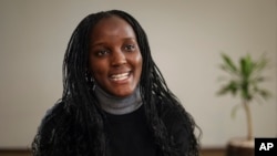 In this file photo, Ugandan climate activist Vanessa Nakate is interviewed by The Associated Press in Kampala, Uganda, Dec. 6, 2021. (AP Photo/Hajarah Nalwadda, file)