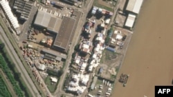 This handout satellite photo released by Planet Labs PBC shows a flooded terminal of the port of Durban, South Africa, April 14, 2022. (AFP photo/ HO/ Planet Labs PBC)