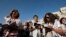 Jewish women activists, members of the Women of the Wall group, pray during a monthly prayer session at a spot a short distance from Western Wall plaza in Jerusalem's Old City, July 8, 2013.
