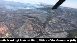 A burnout area between Parowan and Brian Head, seen during a wildfire tour by Utah Lt. Gov. Spencer Cox, in southern Utah, June 26, 2017. The nation's largest wildfire has forced more than 1,500 people from their homes and cabins in a southern Utah mountain area home to a ski town and popular fishing lake.