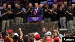 Republican presidential nominee and former U.S. President Donald Trump speaks during a campaign rally in Prescott Valley, Arizona, Oct. 13, 2024. 