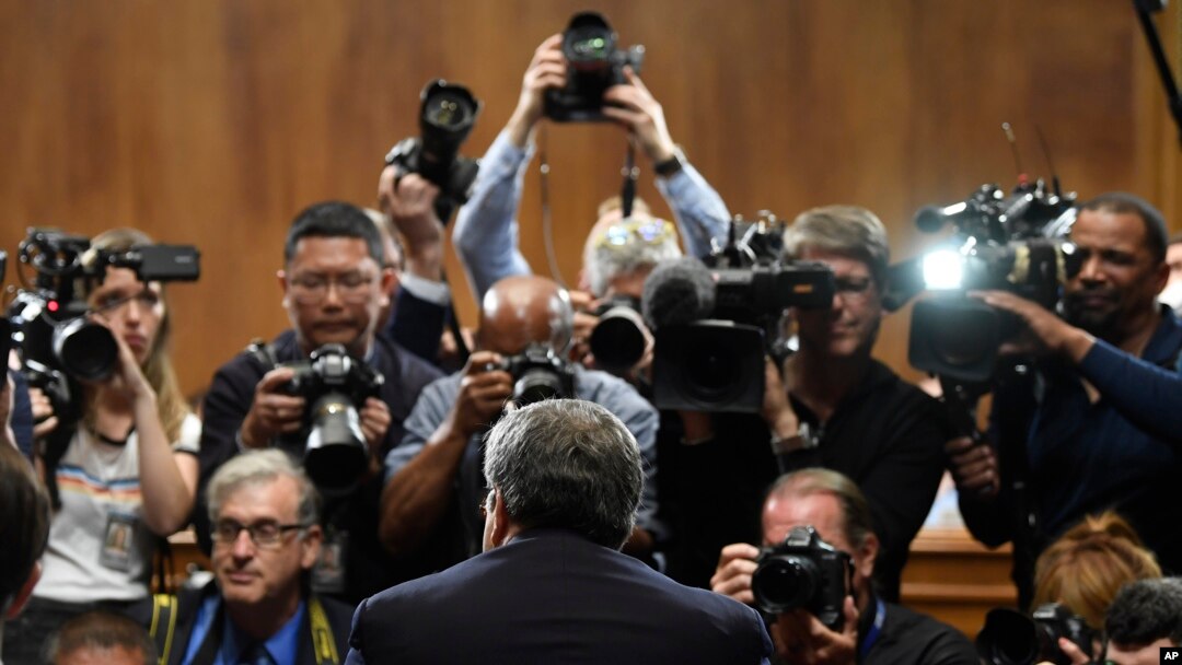 Attorney General William Barr is photographed as he sits down to testify before the Senate Judiciary Committee on Capitol Hill in Washington, May 1, 2019.