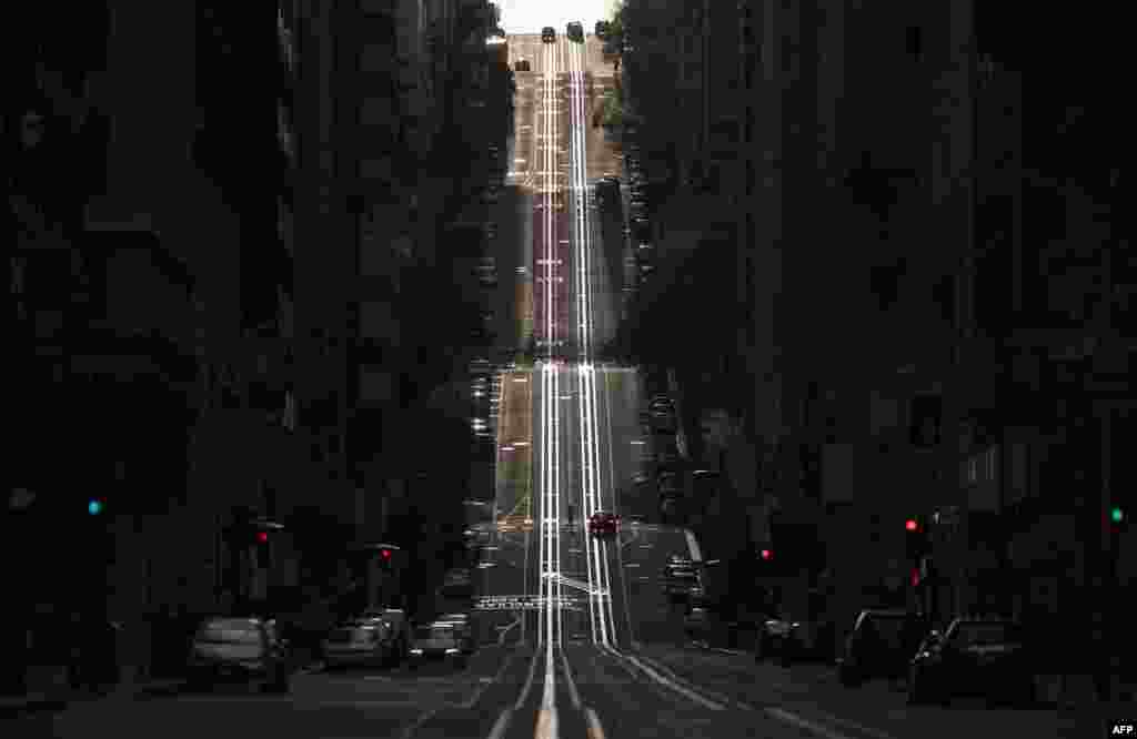 California Street, usually filled with cable cars, is seen empty in San Francisco, California, March 18, 2020.