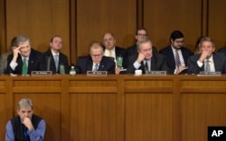 Senate Judiciary Committee members, from left, Sen. John Kennedy, R-La., Sen. Thom Tillis, R-N.C., Sen. Mike Crapo, R-Idaho, and Sen. Jeff Flake, R-Ariz., listen on Capitol Hill in Washington as Supreme Court nominee Neil Gorsuch answers a question during his confirmation hearing before the committee, March 21, 2017.