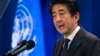安倍宣布推迟增税 提前举行选举