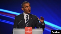 "Estados Unidos debería escribir las normas (comerciales)...Otros países deberían cumplir las reglas que Estados Unidos y sus socios establezcan, y no al contrario", dice el presidente Barack Obama.