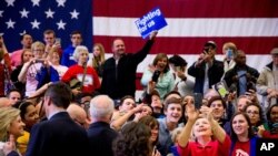 Democratic presidential candidate Hillary Clinton takes a group selfie after speaking at a get out the vote event at Transylvania University in Lexington, Kentucky, Monday, May 16, 2016.