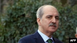 Turkish Deputy Prime Minister Numan Kurtulmus (C) gives a statement flanked by Turkish Interior Minister Efkan Ala (R) and Turkish Health Minister Mehmet Muezzinoglu (L) after a security meeting at the Cankaya Palace in Ankara, Jan. 12, 2016, 