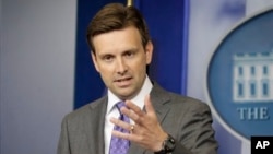 White House Deputy Press Secretary Josh Earnest speaks during his daily news briefing at the White House, Aug. 21, 2013.