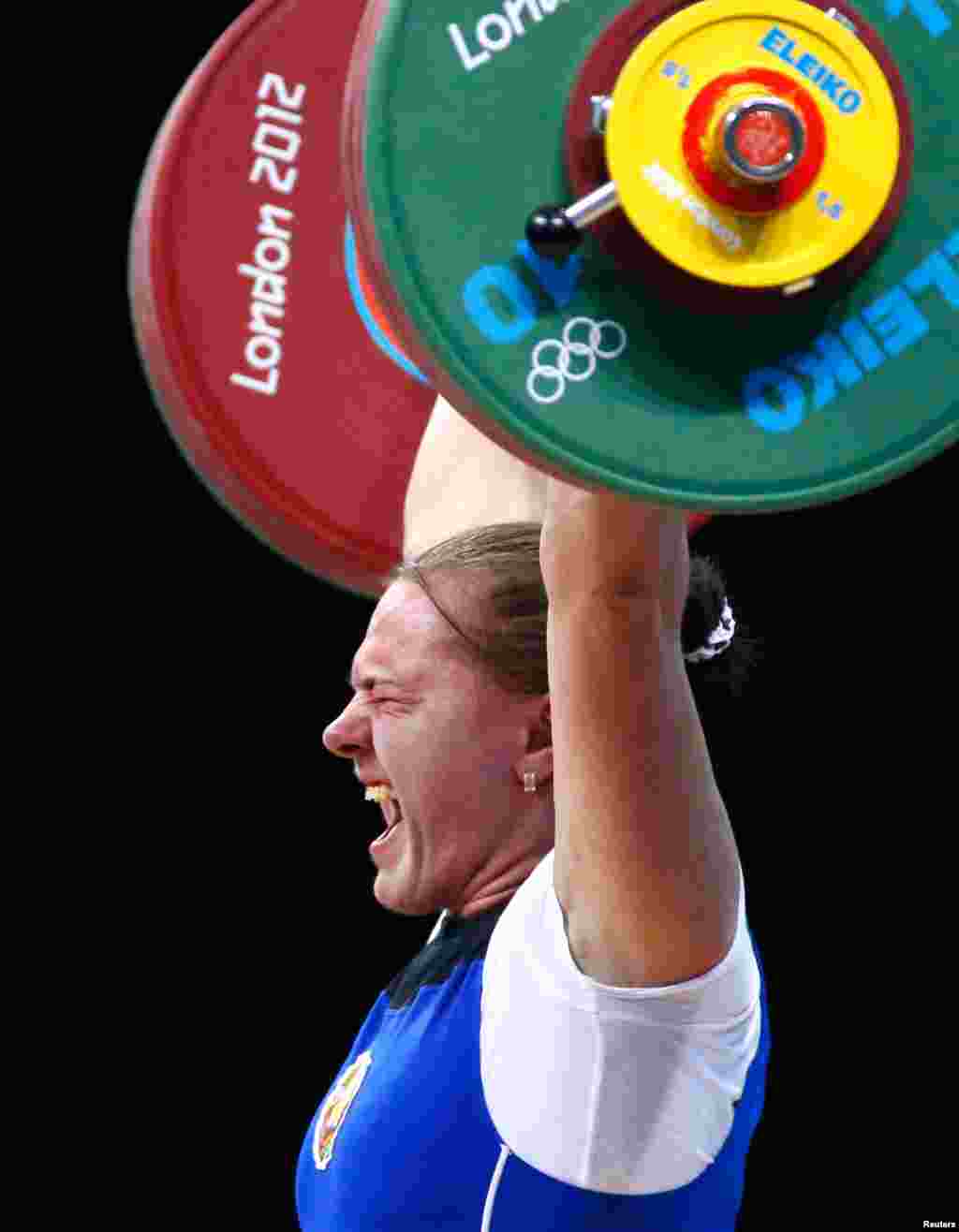 Belarus' Iryna Kulesha lifts on the women's 75kg group A weightlifting competition.