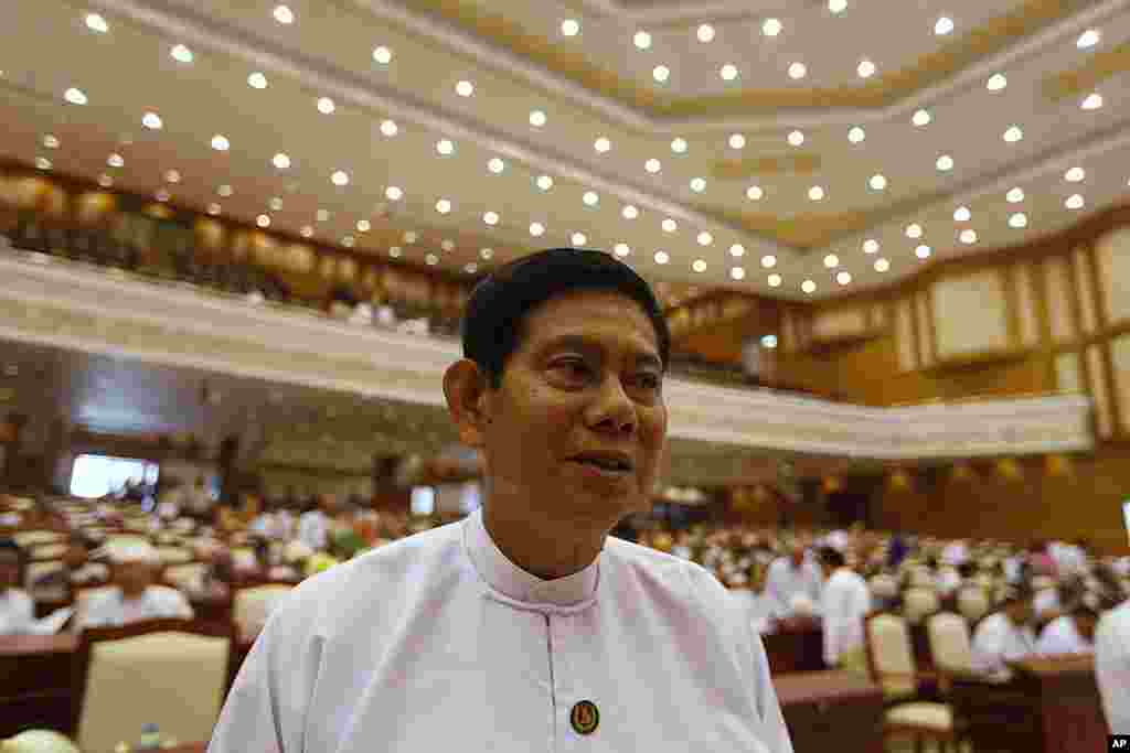 Secretary General of the Union Solidarity and Development Party (USDP) Htay Oo talks to reporters before the Lower House of parliament meeting. (Reuters)