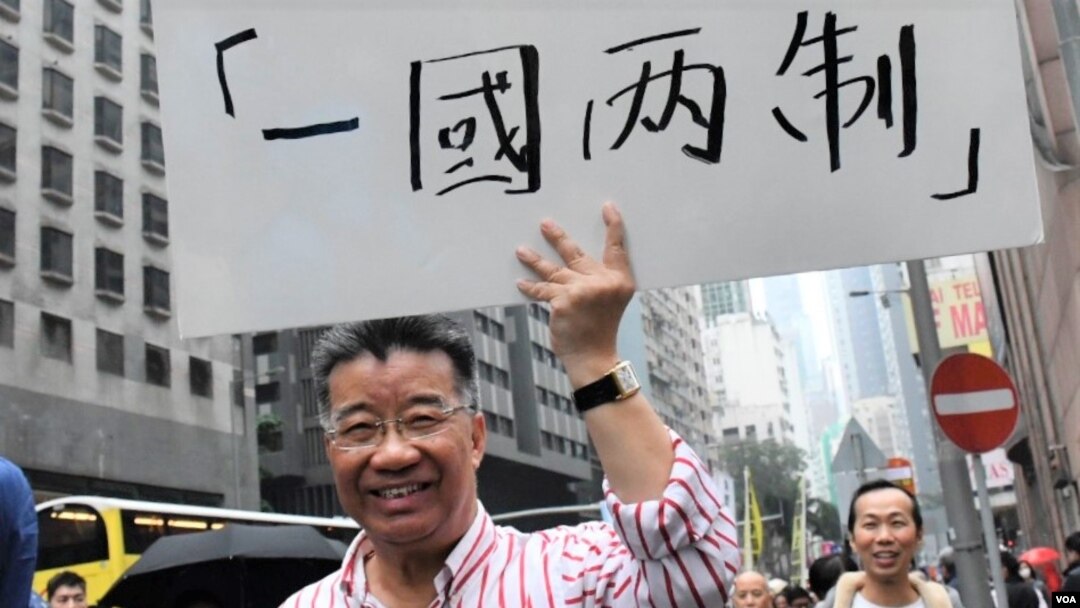 前政協委員劉夢熊分析,警隊出身的李家超有望成為下一任特首,反映中共”槍杆子出政權”的思維模式。(美國之音/湯惠芸)