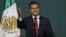 Presidential candidate Enrique Pena Nieto speaks to supporters at his party's headquarters in Mexico City, Mexico, July 2, 2012.