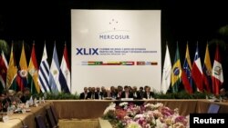 FILE - General view of the Summit of Heads of State of MERCOSUR and Associated States and 49th Meeting of the Common Market Council in Luque, Paraguay, Dec. 21, 2015. 