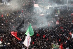 Mourners attend a funeral ceremony for Iranian Gen. Qassem Soleimani and his comrades, who were killed in Iraq in a U.S. drone strike on Friday, at the Enqelab-e-Eslami (Islamic Revolution) square in Tehran, Iran, Jan. 6, 2020.