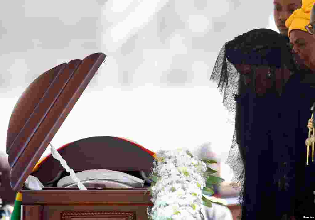 Former first lady of Zimbabwe, Grace Mugabe, pays her last respects during a state funeral of her husband and the country's longtime ruler Robert Mugabe, at the national sports stadium in Harare, Sept. 14, 2019. 